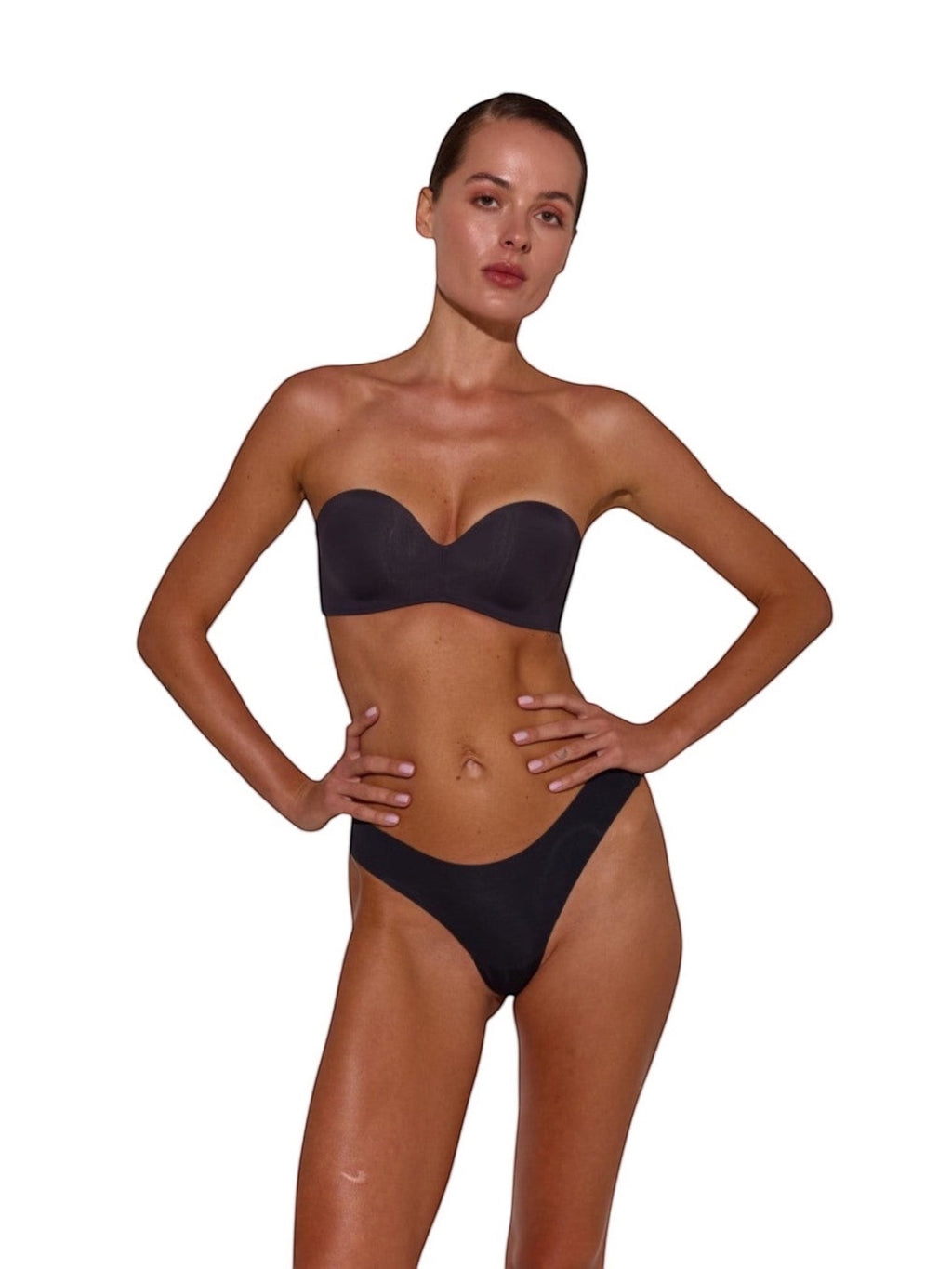 LIA STUDIO LINGERIE Magnolia black strapless balconette bra with double push-up in matte microfiber on a model.